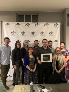 The UA Creative Studios team posing with their award at the 2019 Golden Goose Awards